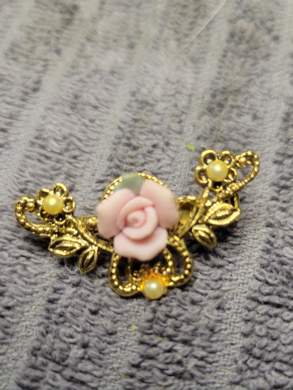 BUNDLE SALE ITEM.6 FOR $15!!...Victorian brooch featuring a pink porcelain rose,